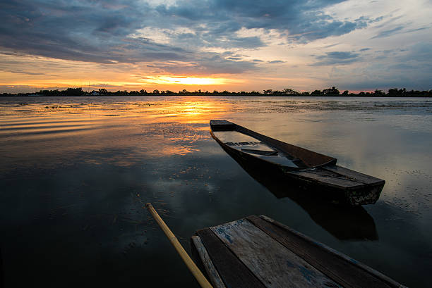 istock Small fishing boat in sunset. 540843094