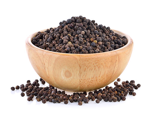 istock peppercorn in wood bowl 540843150