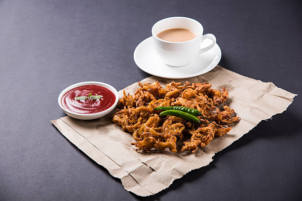 istock onion bhaji or pakora served with tomato ketchup and tea 540843770