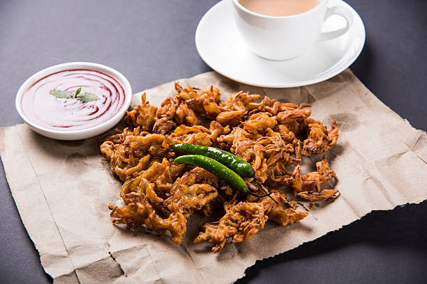 istock onion bhaji or pakora served with tomato ketchup and tea 540844294