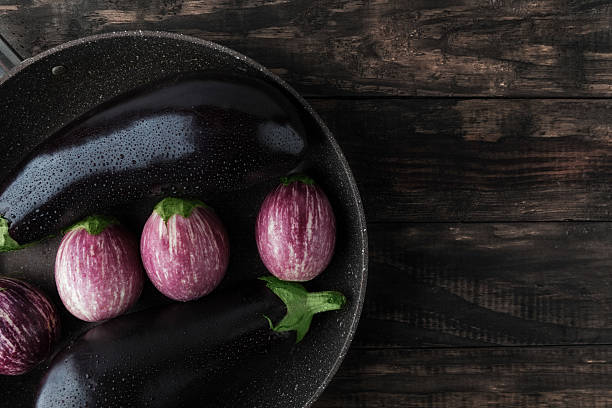 istock Wet eggplants in frying pan with copy space 540844486