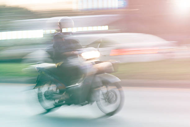 istock scooter rider on a bike lane 540845068
