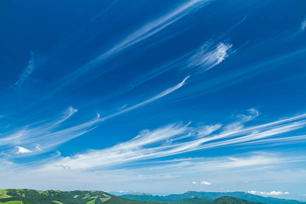 Cirrus in blue sky Photo taken at Tateshina Highlands, Nagano Prefecture cirrus stock pictures, royalty-free photos & images