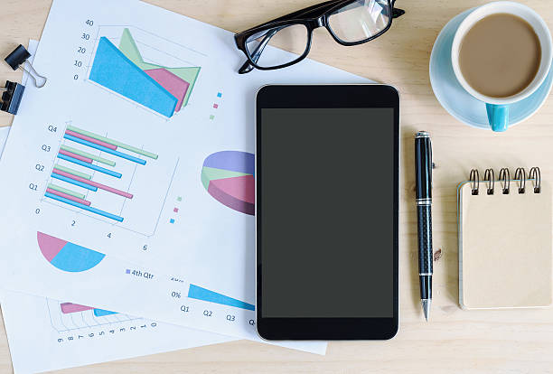 istock Tablet and a cup of coffee on desk office 540847672