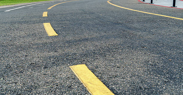 istock Asphalt road with yellow line 540848046