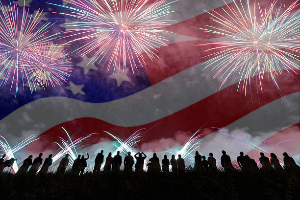 istock Group of people enjoying fireworks show 540851122