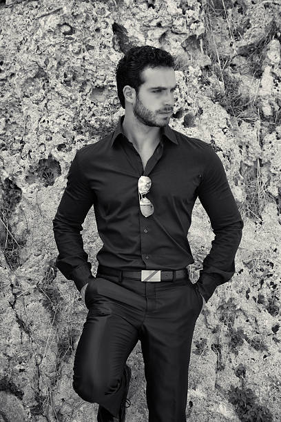 istock Gorgeous Young Businessman Against Boulder 540851360