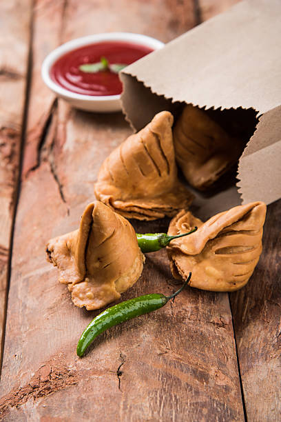 istock Samosa snack with tomato ketchup and hot tea 540854824