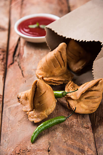 istock Samosa snack with tomato ketchup and hot tea 540855620