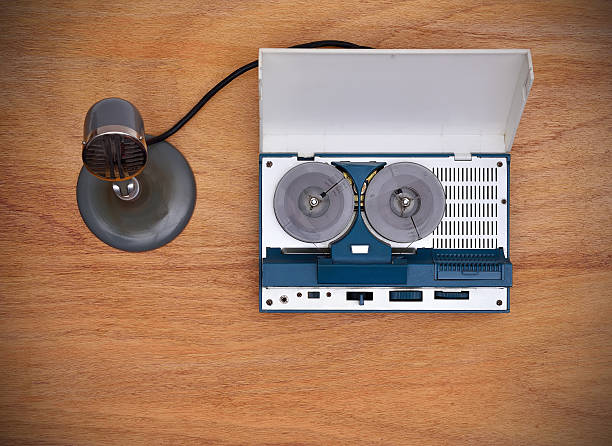 istock Reel tape recorder and microphone 540856524