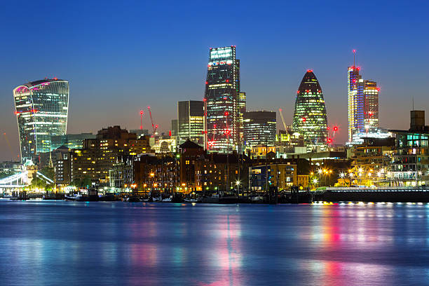 istock Cityscape of London with reflection in Thames river, UK 540857590