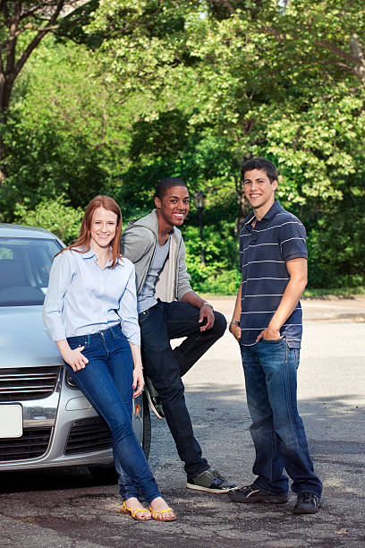 istock Teenagers with car 540858154