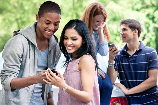 istock Teenagers with car 540858570