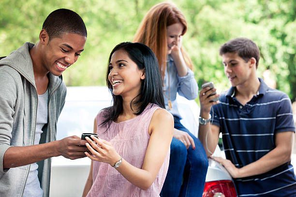 istock Teenagers with car 540858762