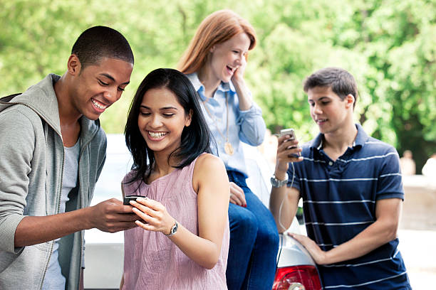 istock Teenagers with car 540858966