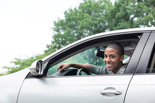 istock Teenagers driving car 540860142