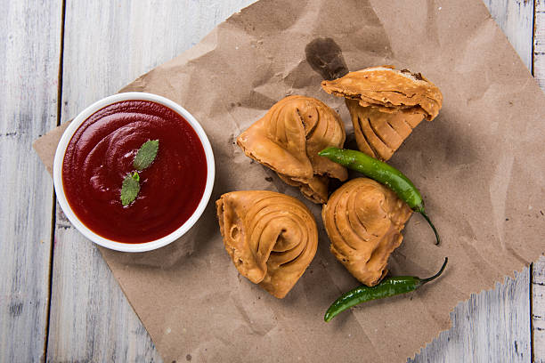 istock Samosa snack with tomato ketchup and hot tea 540860522