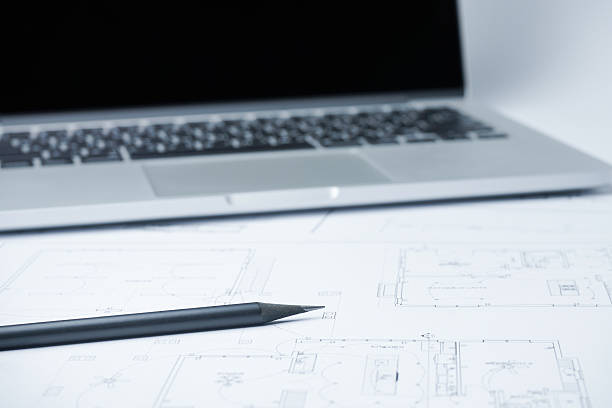 istock black pencil on architectural drawing paper and rolls for constr 540860852