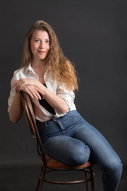 istock girl on a chair 540860958