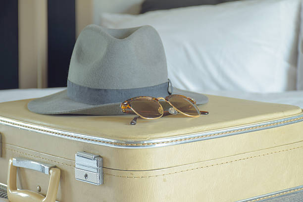 istock Hat and sunglasses on vintage travel bag 540861894