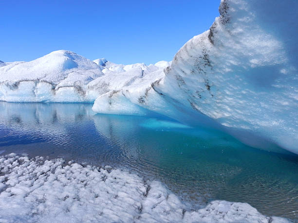 istock Ice cave with deep blue water in Greenland 540862508