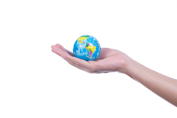 istock Earth planet in female hand 540863008