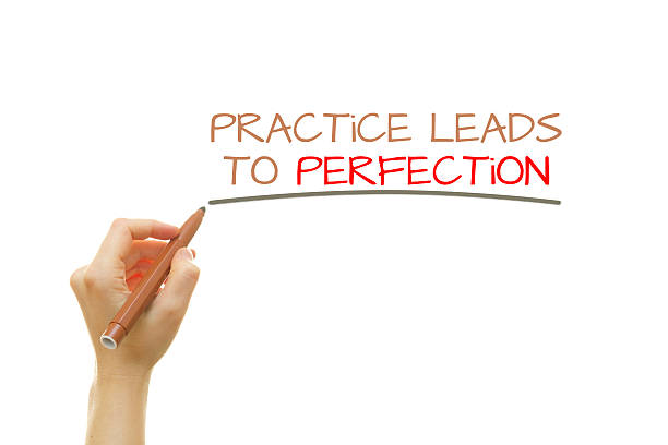 istock Hand writing Practice leads to perfection 540865888