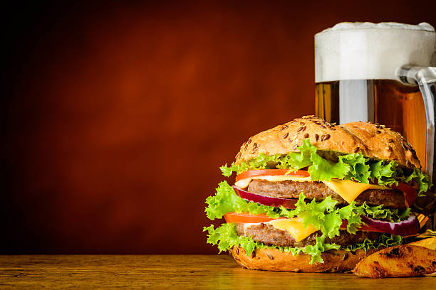 istock Burger and Mug of Cold Beer with Copy Space 540867738