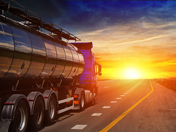 istock Tanker with chrome tanker on the highway. Working visit 540868924