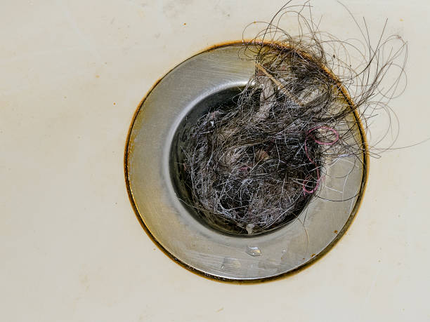 Steckloch gefüllt mit Haaren – Foto