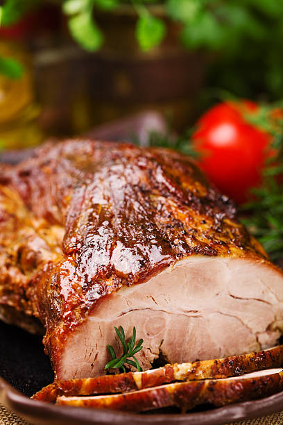istock Roast pork with herbs and vegetables. 540872138