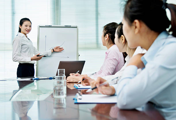 istock Businesswoman giving a presentation 540872222