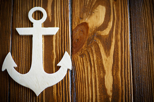istock Wooden nautical anchor 540964366