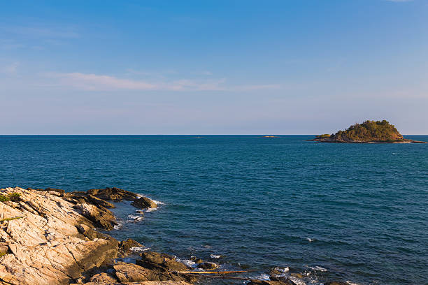 istock Little island nearby rocky beach skyline 540968270