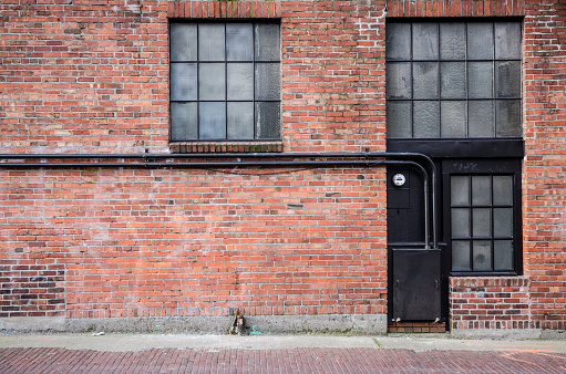 Old brick alleyway with windows