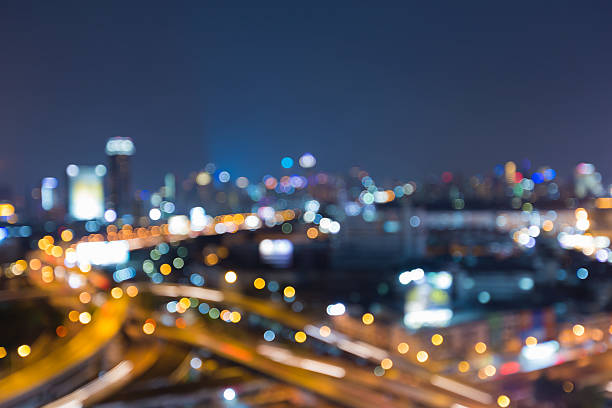 istock Blurred lights, city road interchanged and office building 540968684