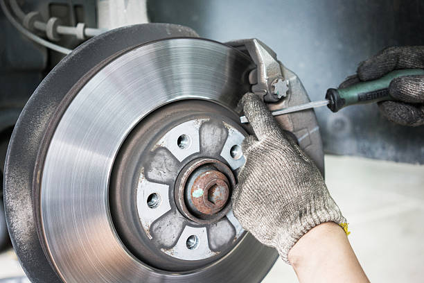 istock Close-up of car mechanic working with tool 540969492