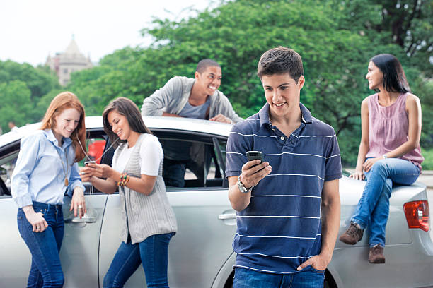 istock Teenagers with car 540969728