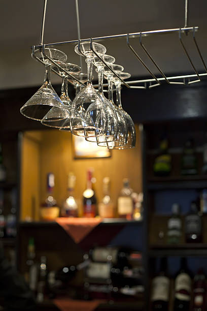 istock Wine glasses hanging near bar counter 540978520