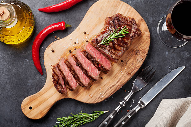 istock Grilled striploin steak and wine 540979716