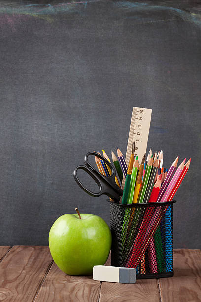 istock School and office supplies and apple 540980690