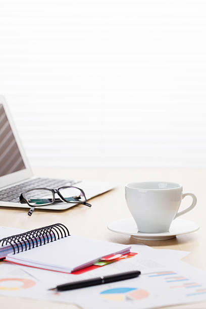 istock Office workplace with with laptop and coffee 540982874