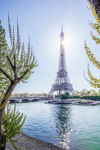 The famous Eiffeltower in Paris, France and the Seine river. 
