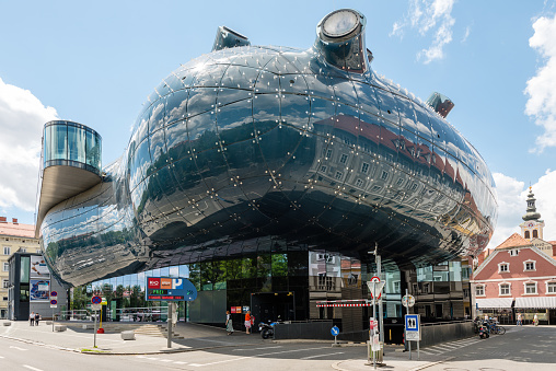 Graz, Austria - June 18, 2016: Kunsthaus Graz, an exhibition centre for contemporary art. The Kunsthaus with its futuristic design is also called the Friendly Alien by its architects Peter Cook and Colin Fournier and exhibits Austrian and international art since its opening in 2003.