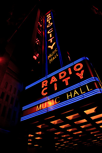 New York City, NY, USA – June 12, 2014: Radio City Music Hall: Radio City Music Hall is an entertainment venue located in Rockefeller Center in New York City. Its nickname is the Showplace of the Nation, and it was for a time the leading tourist destination in the city. Its interior was declared a city landmark in 1978.