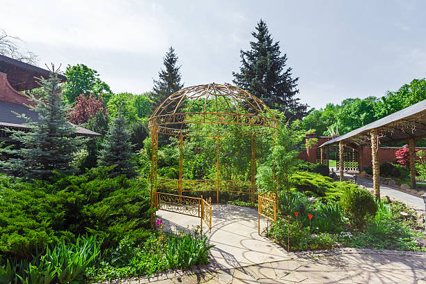 istock Landscape design, garden path to gazebo 540987988