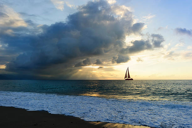 istock Sailboat Sunset Sun Beams 540989444