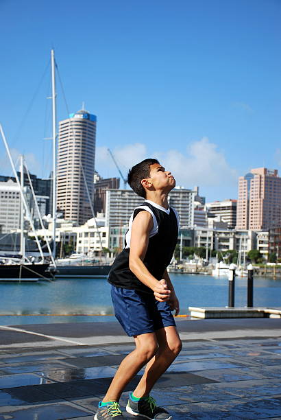 istock Polynesian Boy playing Football 540989790