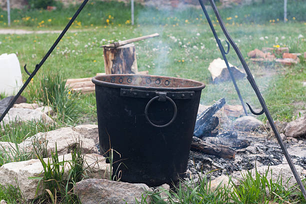 istock Pot water on the fire. Camping photo. 540990206