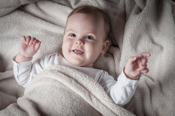 istock Beautiful little girl lying on her back and posing 540994174